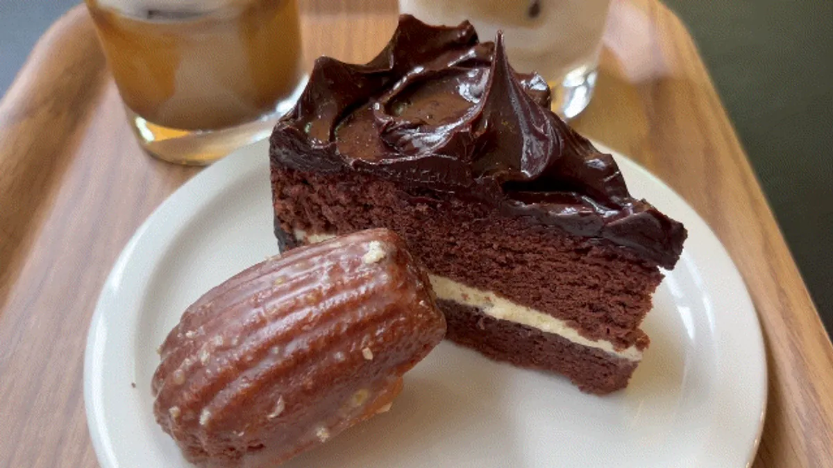 Table with coffee and desserts placed together