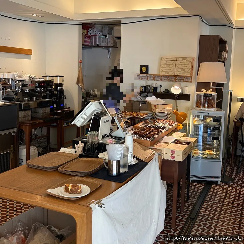 Madeleine and financier display next to the register