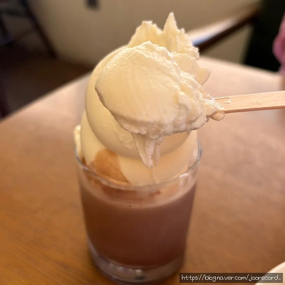 Close-up of ice cream over chocolate latte
