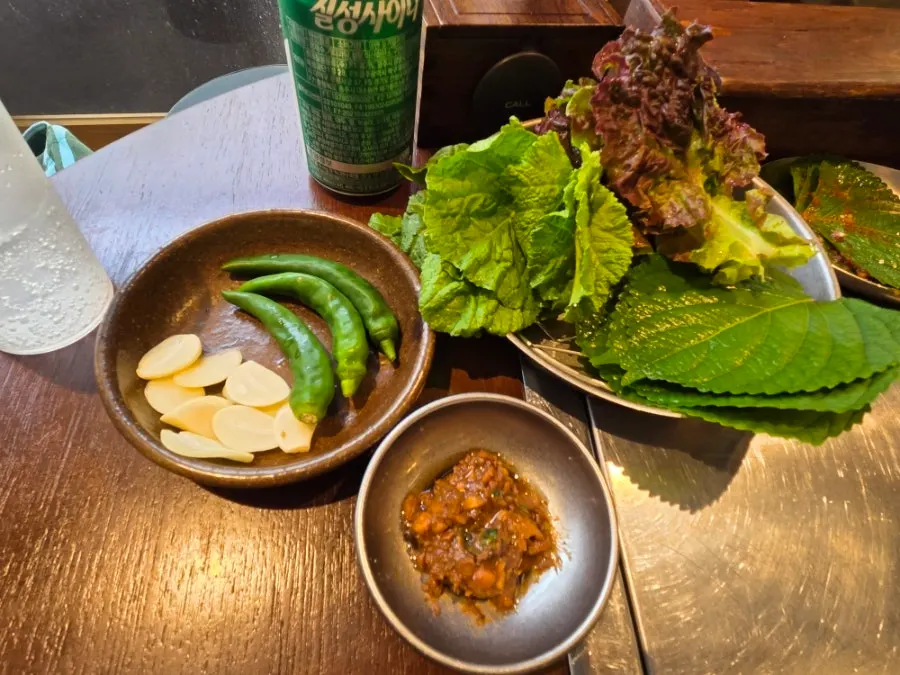 Seasoned perilla leaves, roasted gim, and ssam vegetables