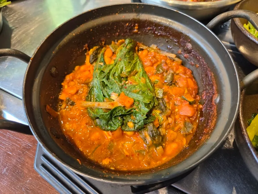 Close-up of gandoenjang in a stone bowl