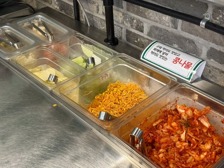 Basic side dish corner with kimchi, bean sprouts, and pickled radish