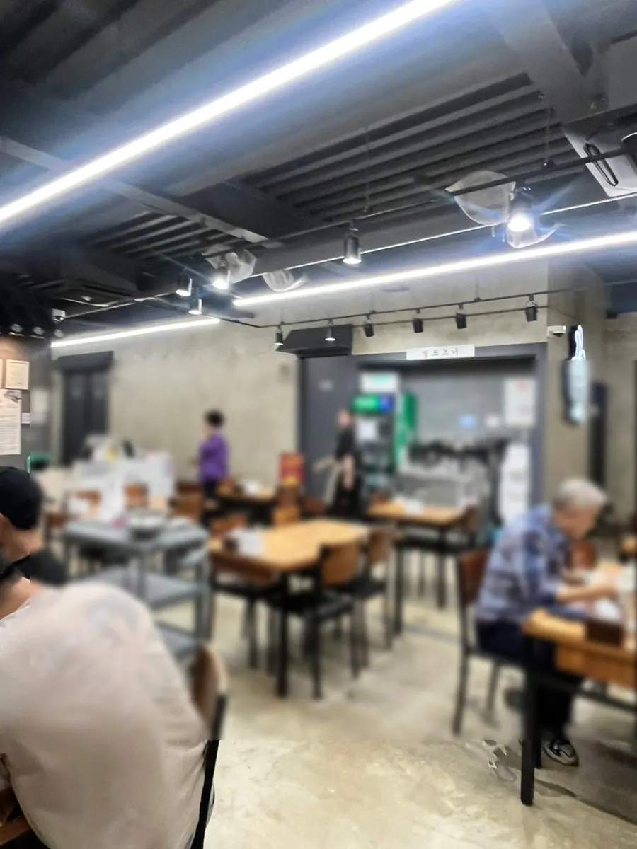 Interior with diners in the evening