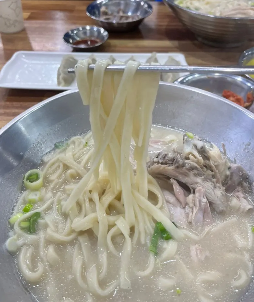 Nutty perilla-seed dak kalguksu broth