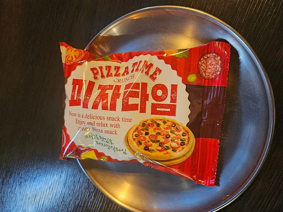 Pizza Time snack cracker and corn kernels served as a basic side dish