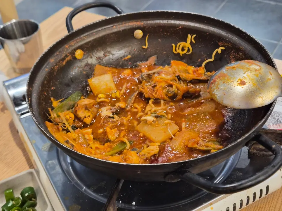 Chewy live octopus served with soju