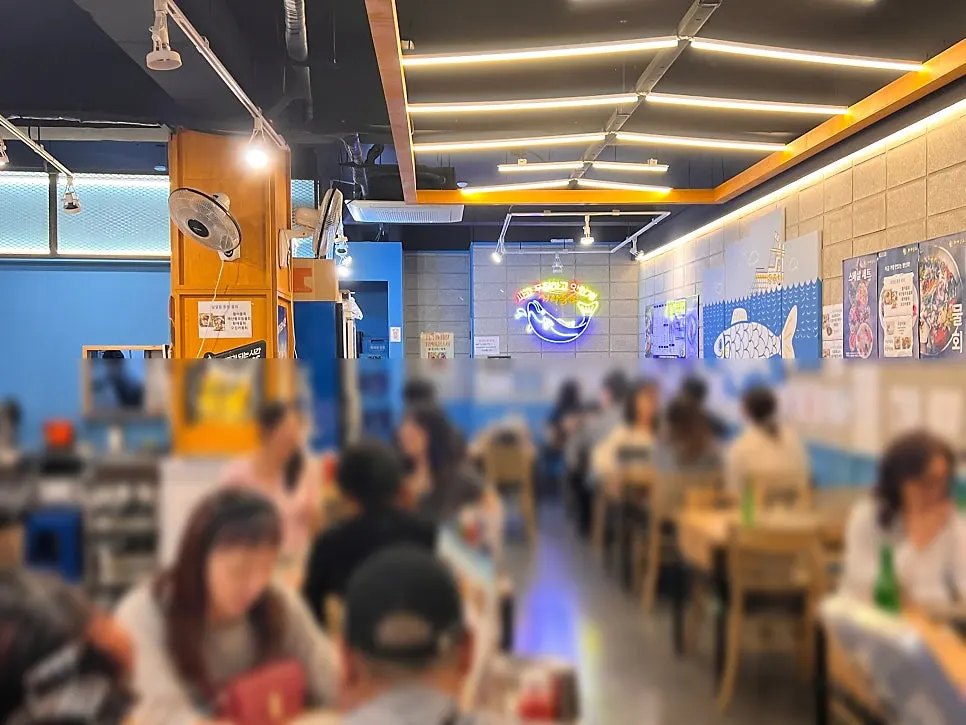 Fully booked interior of Eosa Chulto Hongdae Branch