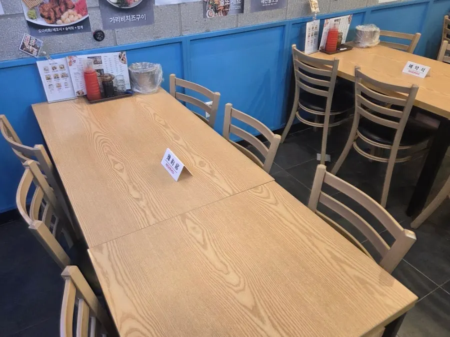 Interior with a mix of tables for four and six