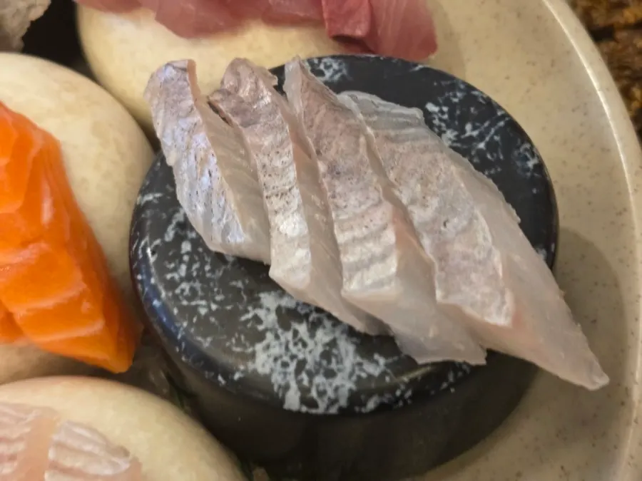 Close-up of the hot, savory fish stew broth