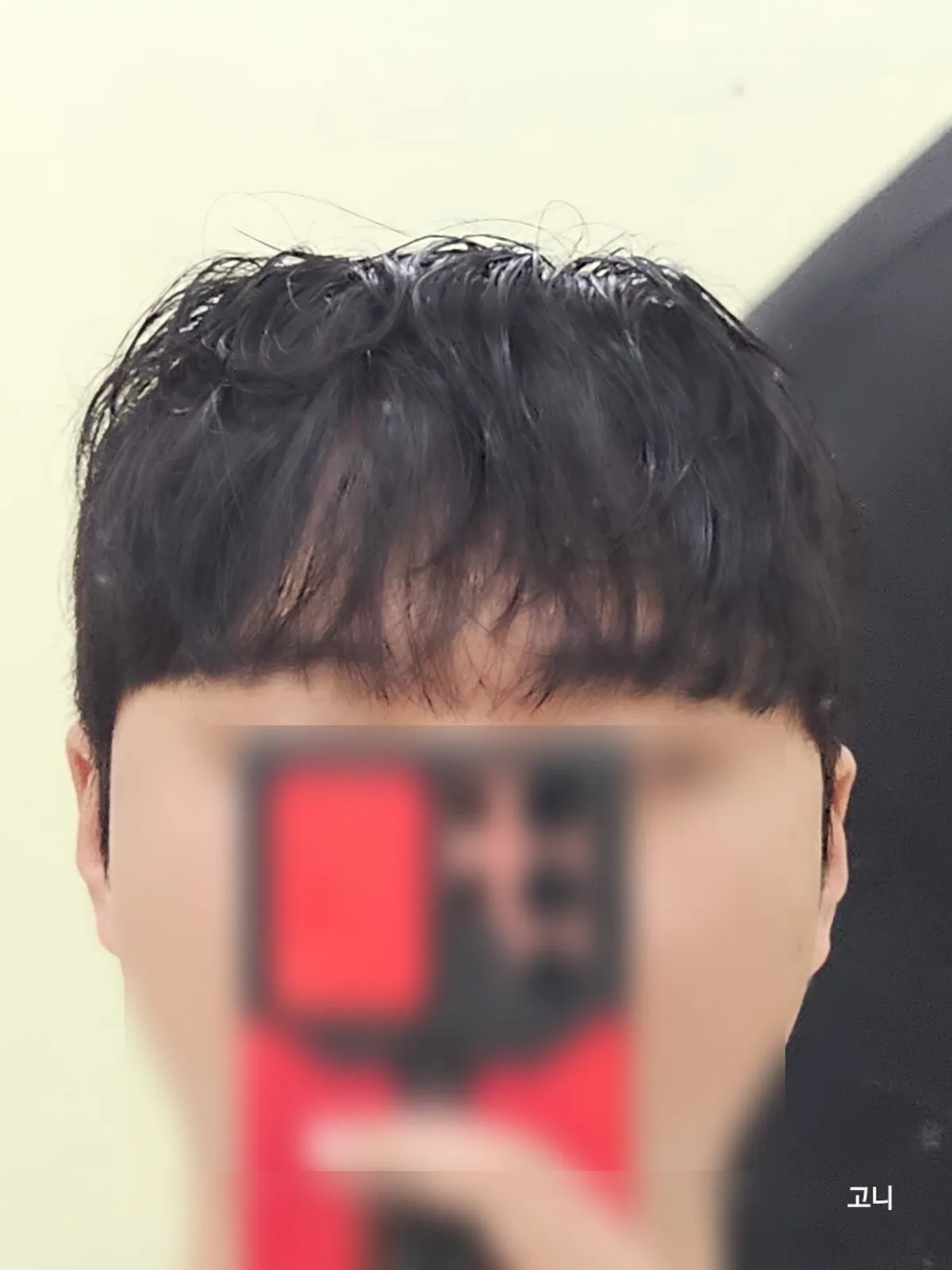 Final hairstyle after the cut and down perm