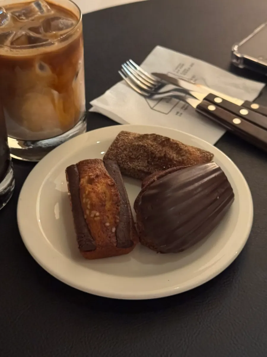 Plate of churro financier and chocolate dessert