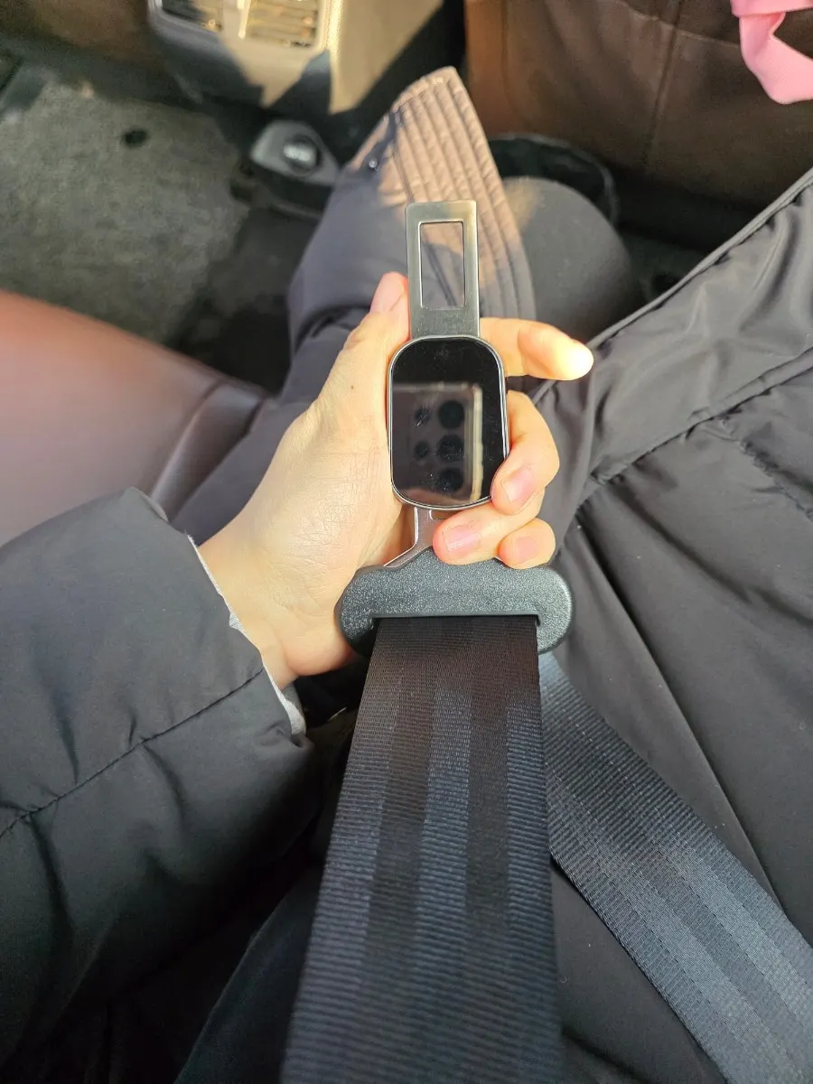 Seat belt extender clip button and connector