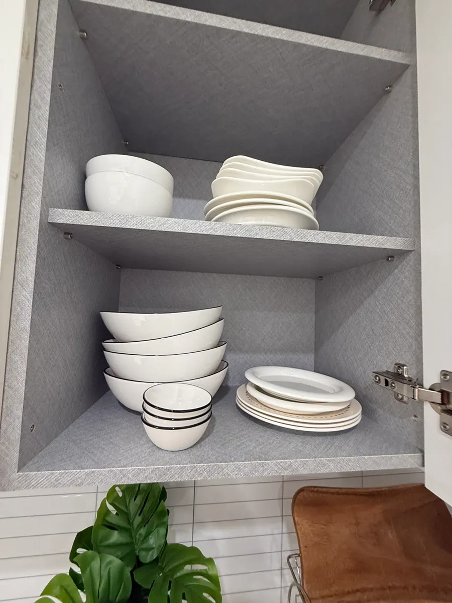 Storage space for cutlery and kitchenware