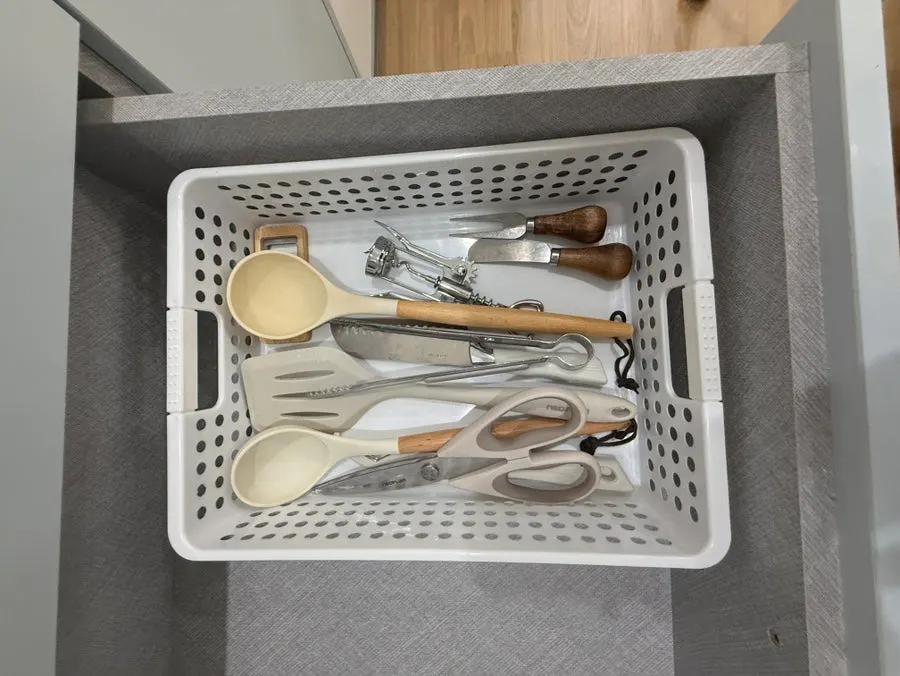 Cooking utensils and cutting board in the kitchen
