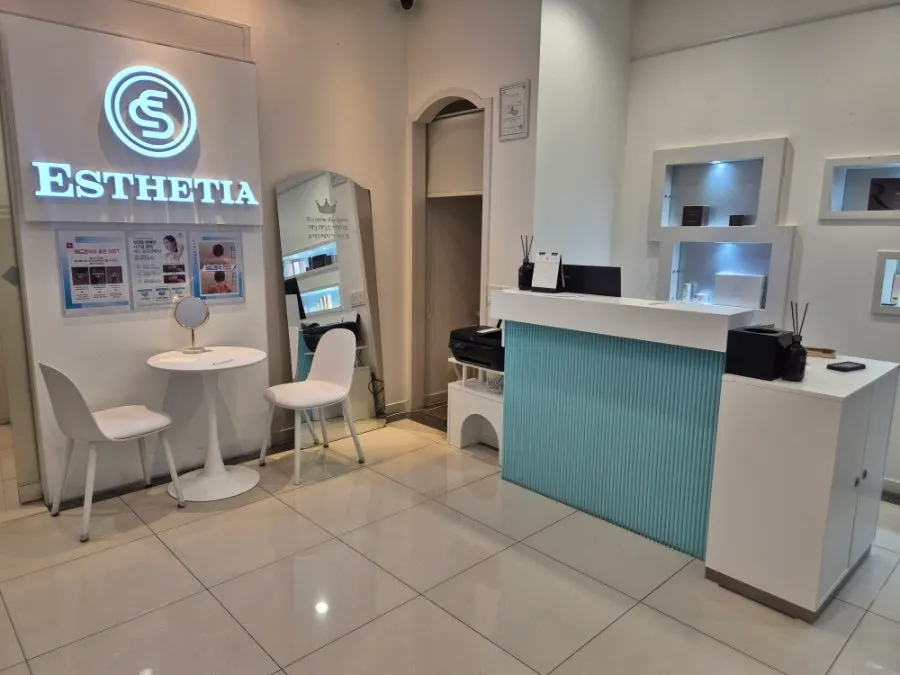 Interior with mint-toned info desk