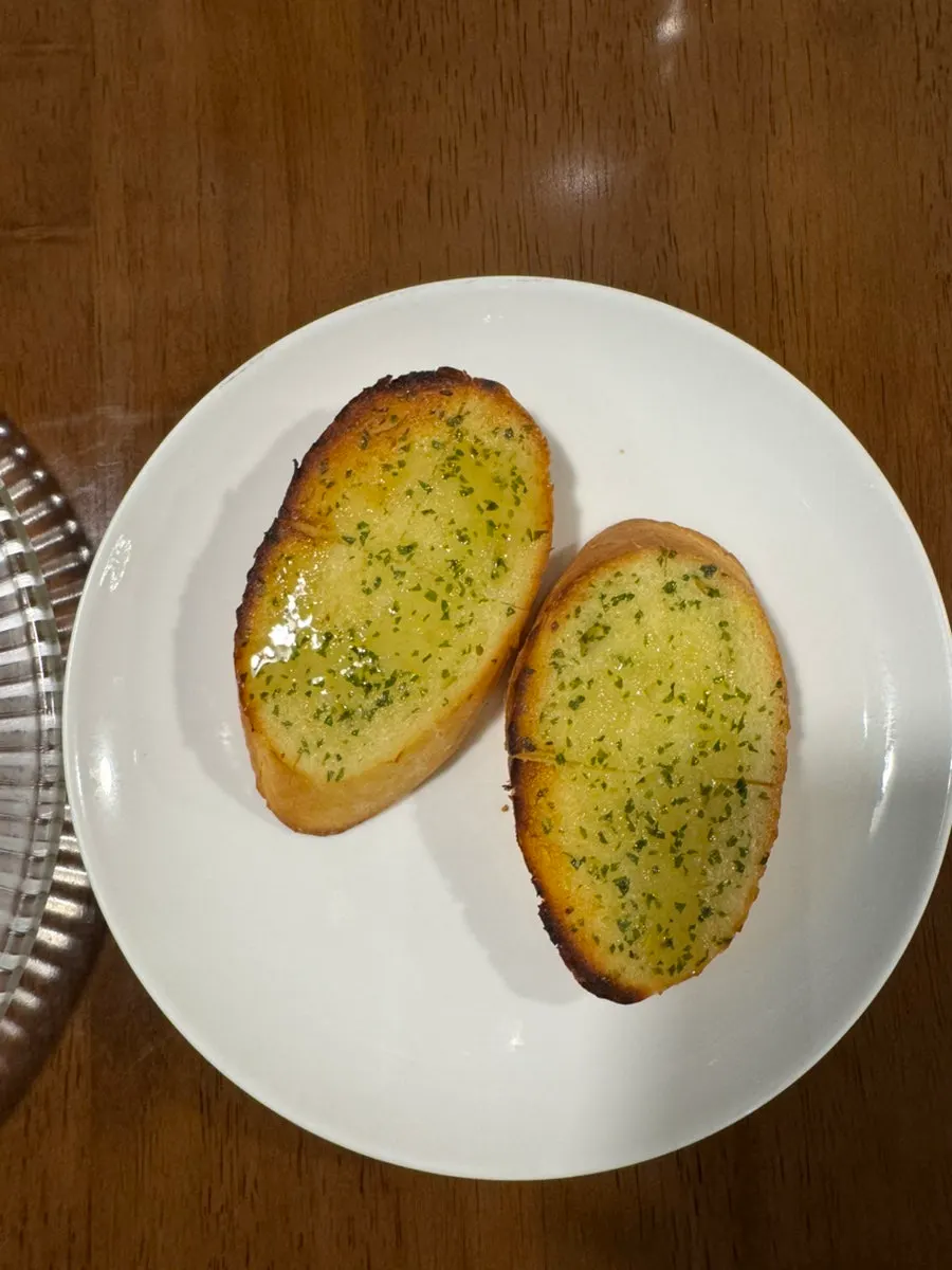 Freshly baked bread served before the meal