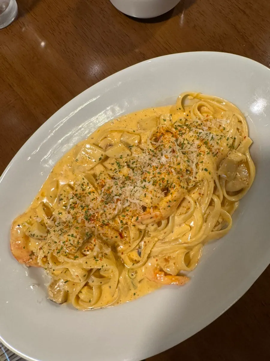 Thick pasta noodles lifted up from the Toowoomba pasta