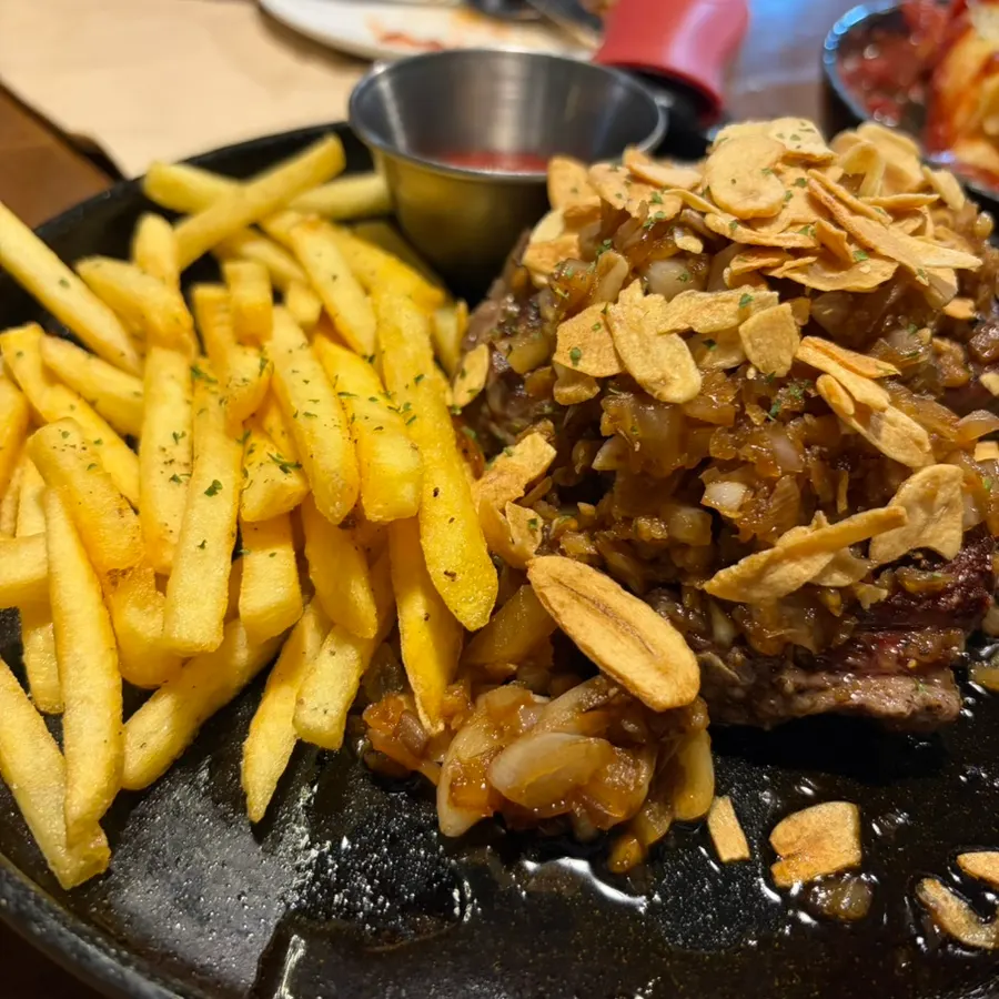 Mammoth Garlic Steak served with fries