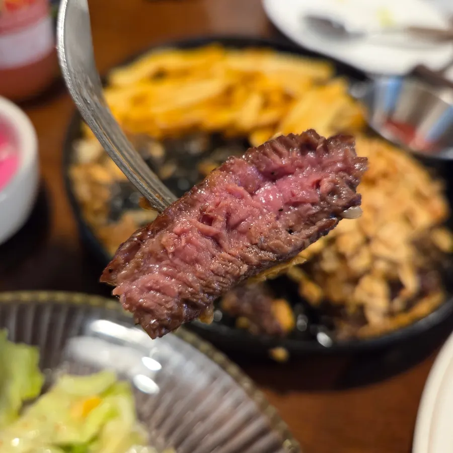 Cross-section of the sirloin steak cut medium-rare