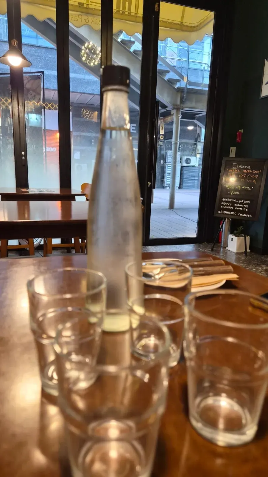 Water bottle on a table at Etrenne Jukjeon Branch