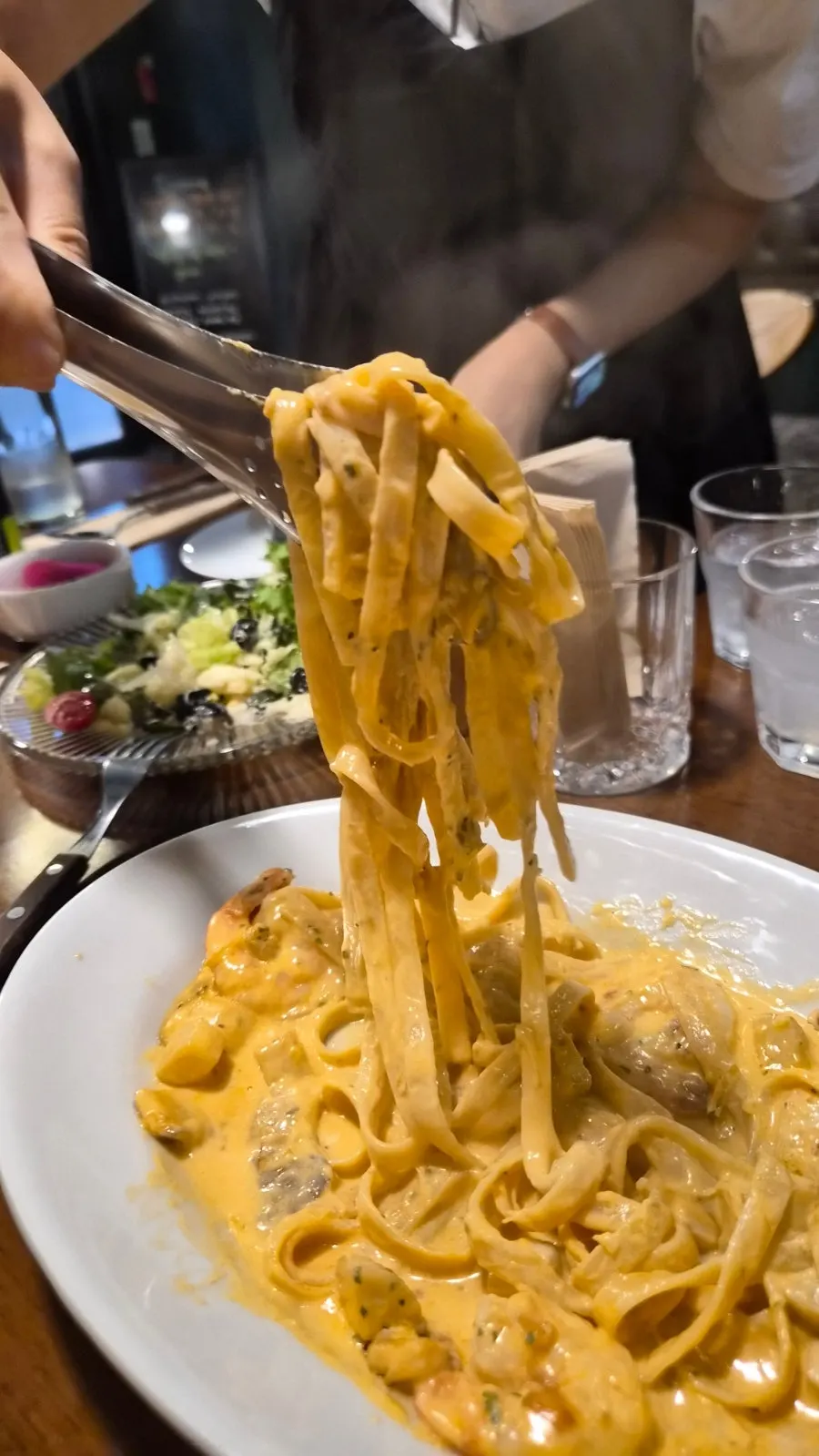 Close-up of Toowoomba pasta's rich cream sauce