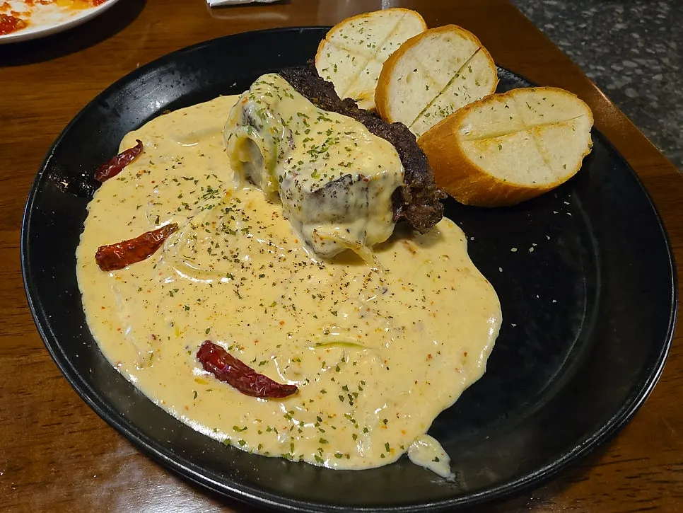 Potato lasagna with cheese and mashed potato