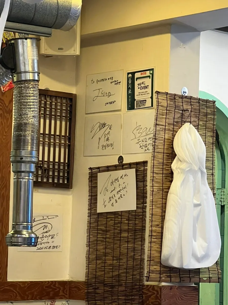 Close-up of the sticky-note guestbook