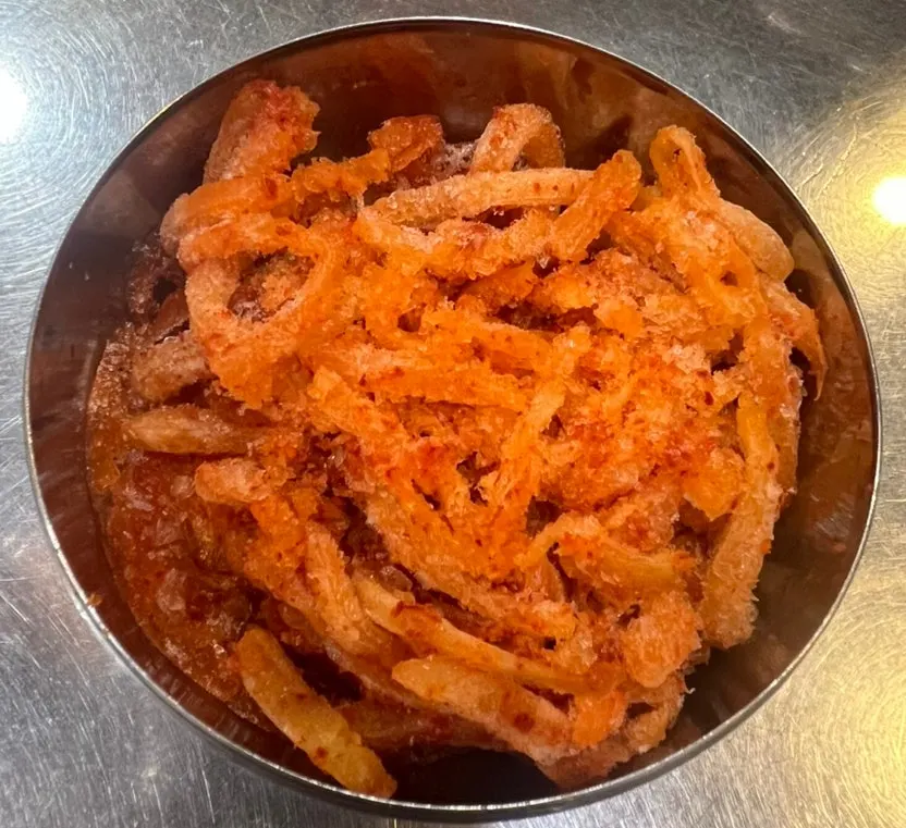 Frozen mu-saengchae (radish salad) served with the meat