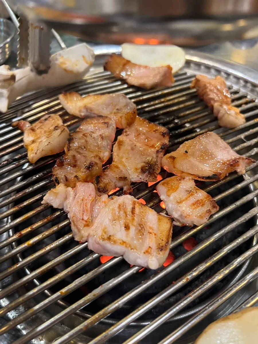 A glass of somaek (soju-beer mix) enjoyed with the meal