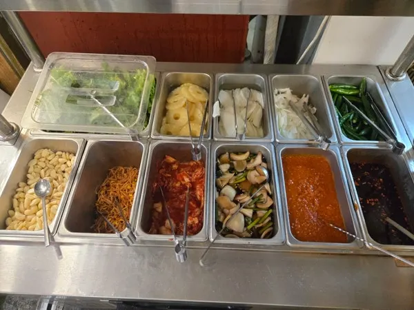 Table set with side dishes at the charcoal BBQ restaurant