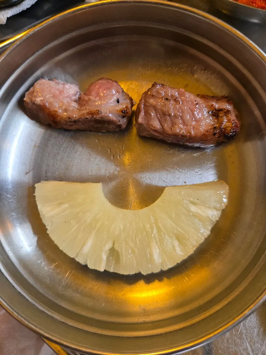 Pineapple grilled over charcoal
