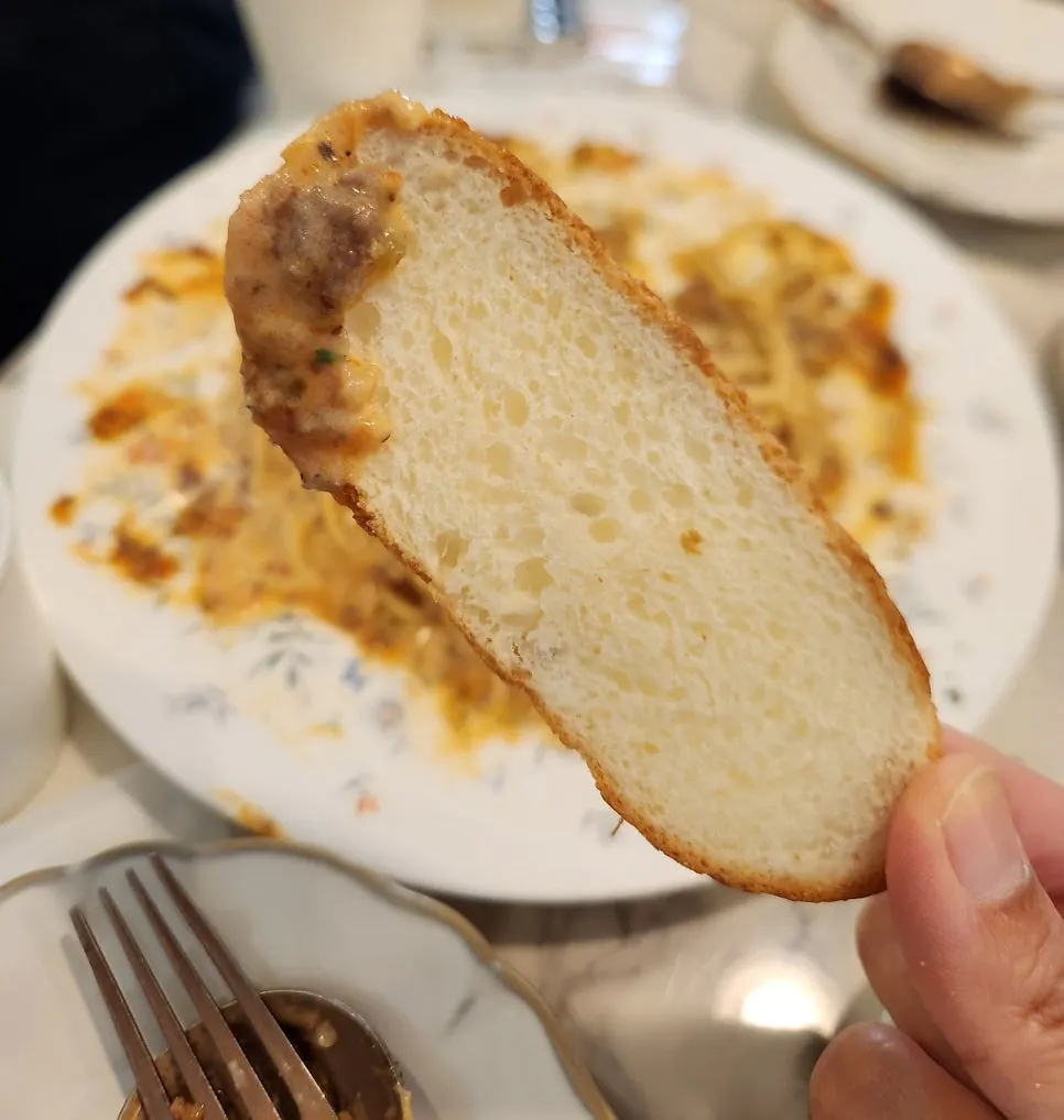 Extra bread dipped in the rose sauce