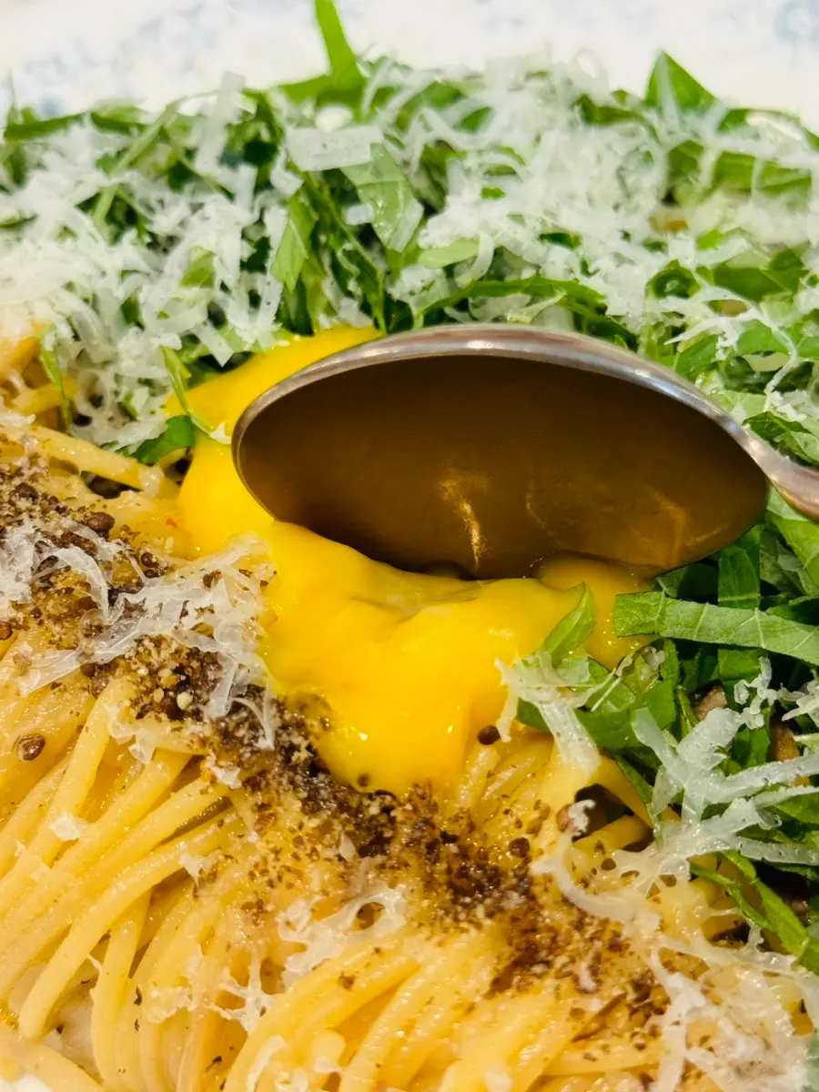 Chadolbagi perilla pasta with the egg yolk burst and mixed in