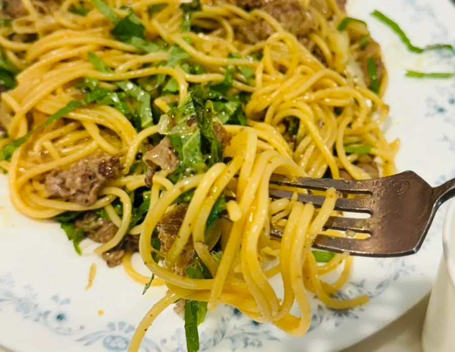 Plate of chadolbagi perilla pasta piled high with perilla leaves