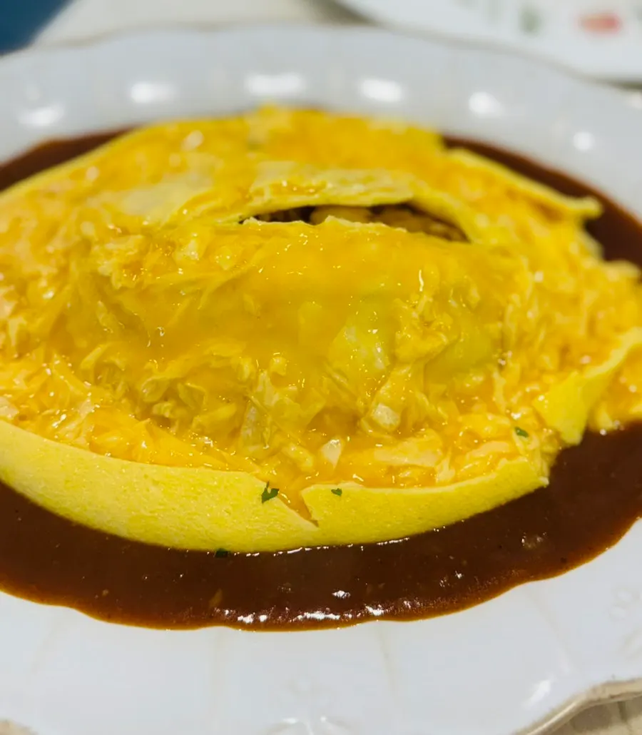 Omurice drizzled with the special sauce