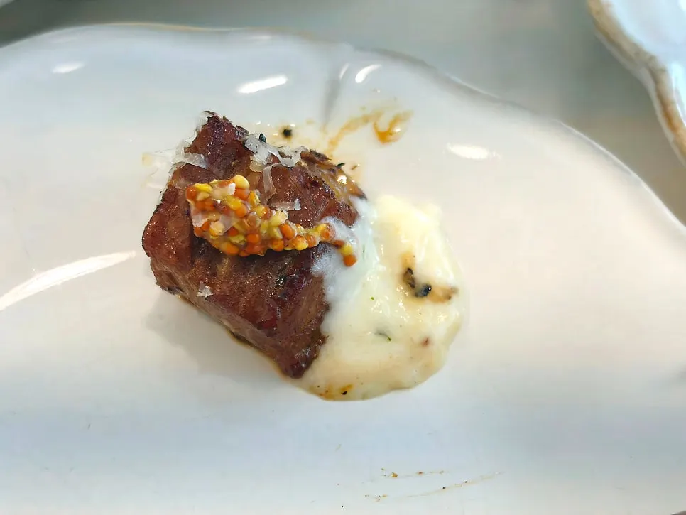 Plating of the pork neck steak at Eulji Darak Gangnam