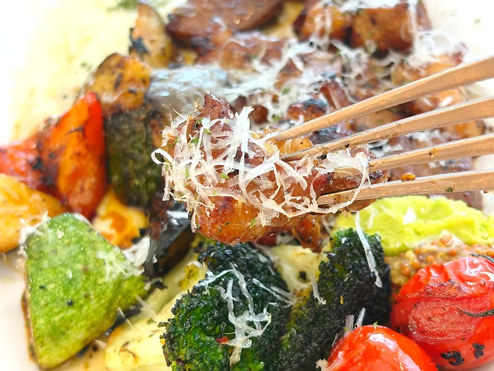 Pork neck steak served with grilled vegetables and mashed potato