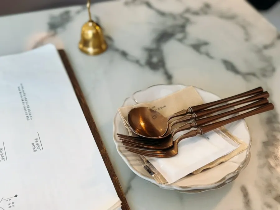 Table set with darak omelet rice and rosé pasta
