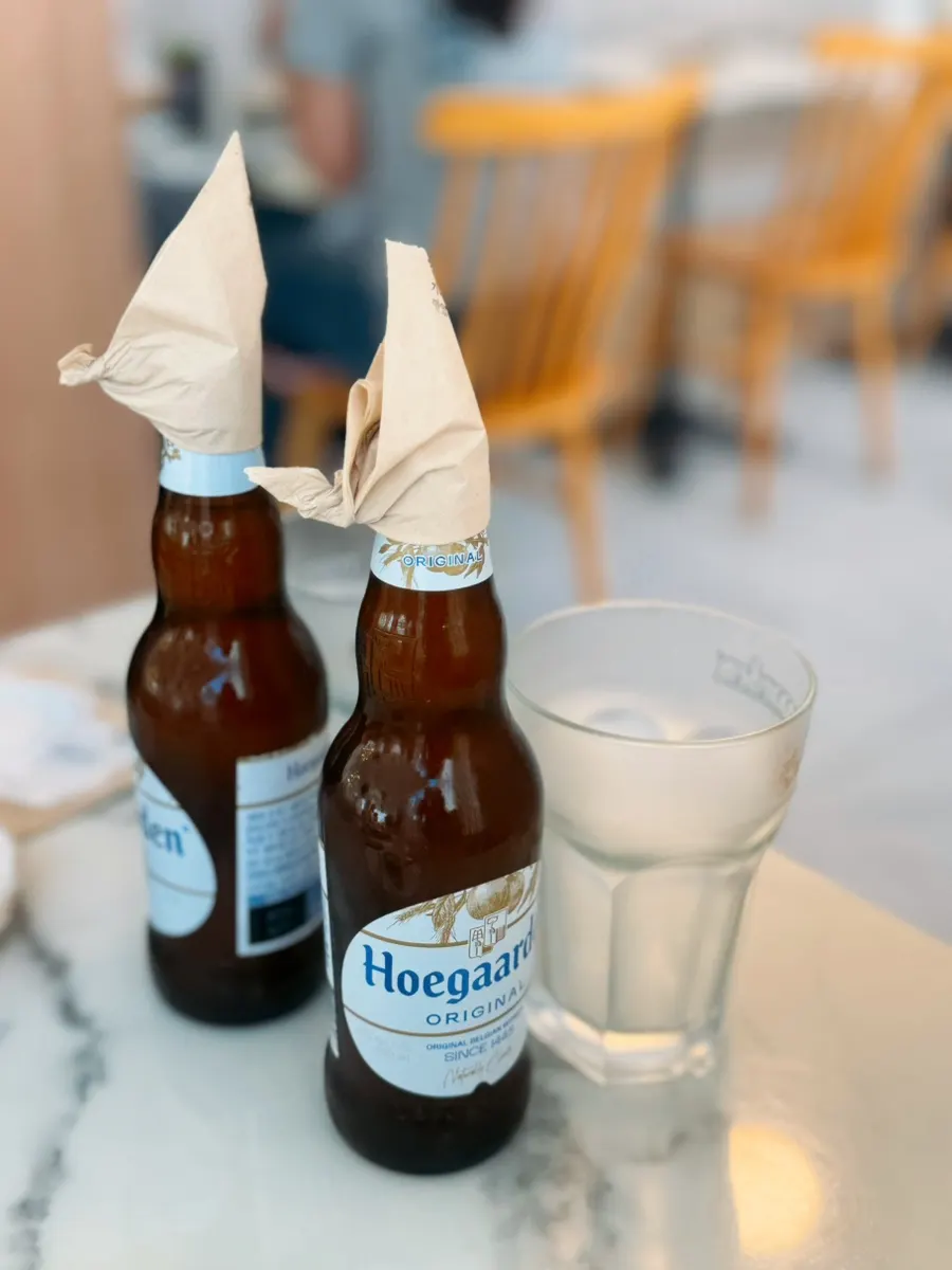 A glass of Hoegaarden draft ordered with the meal