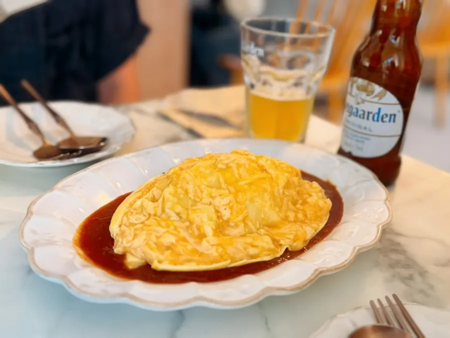 Split omelet with fried rice and handmade sauce