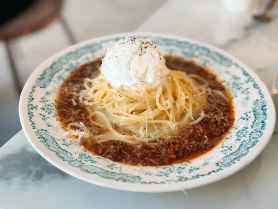 Darak rosé pasta topped with cloud-like cream
