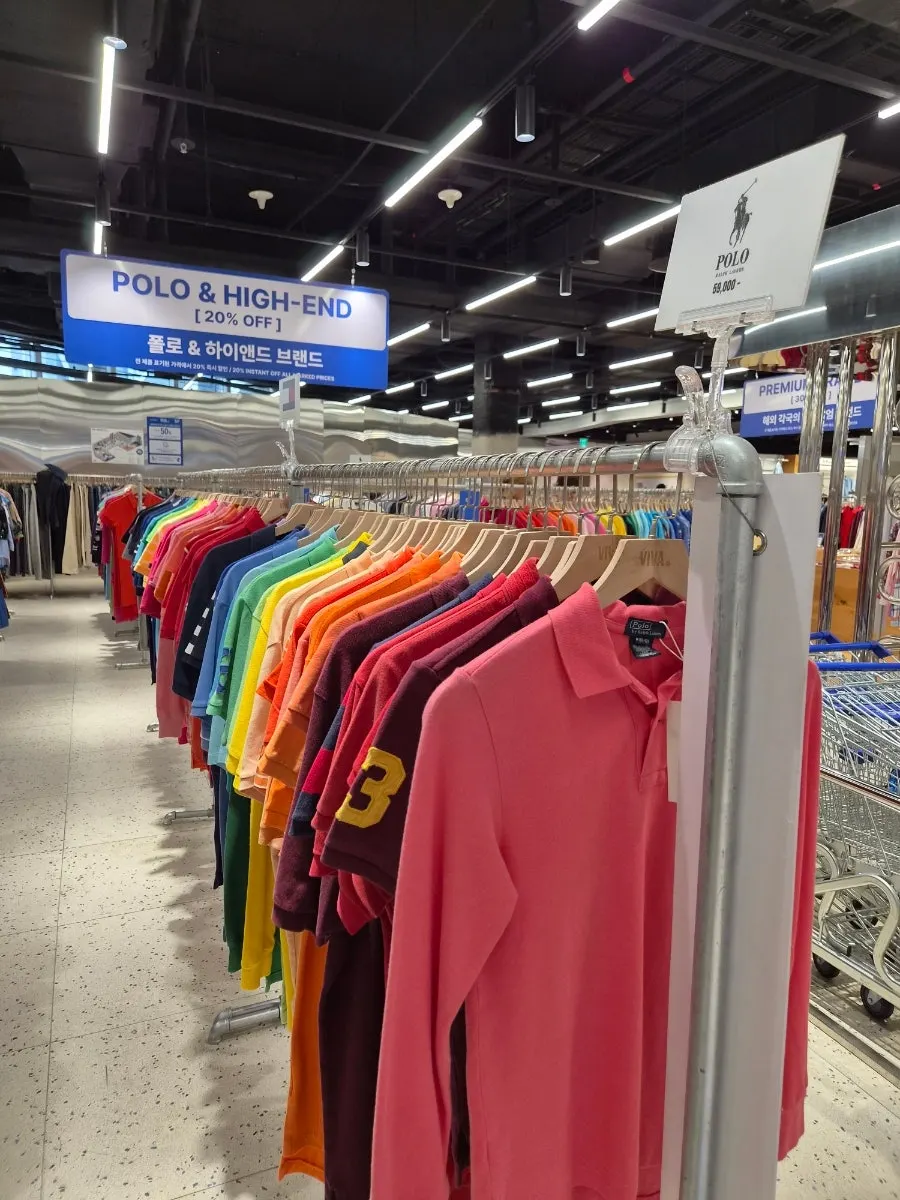 Rack of vintage Polo pieces on hangers