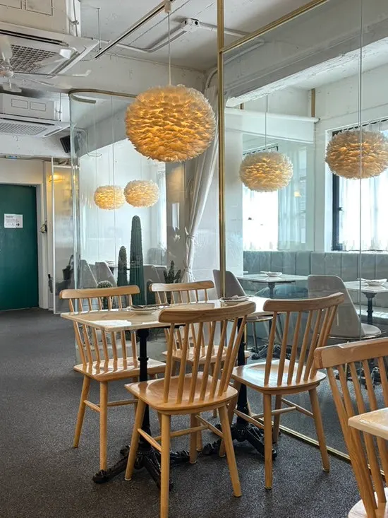 Dining hall seating at Eulji Darak Dosan under soft lighting