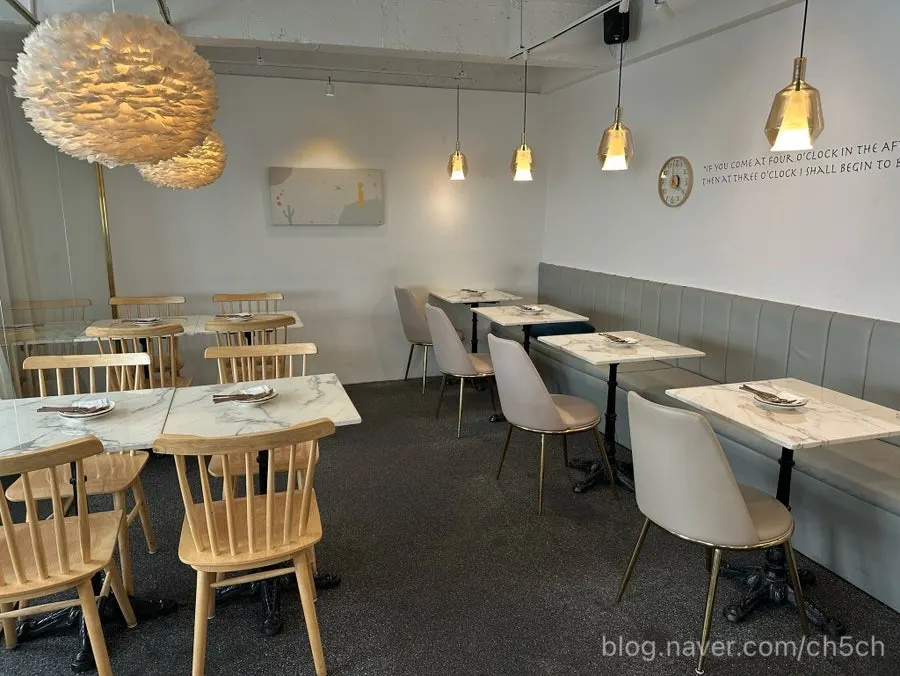 Tables arranged mostly for two people