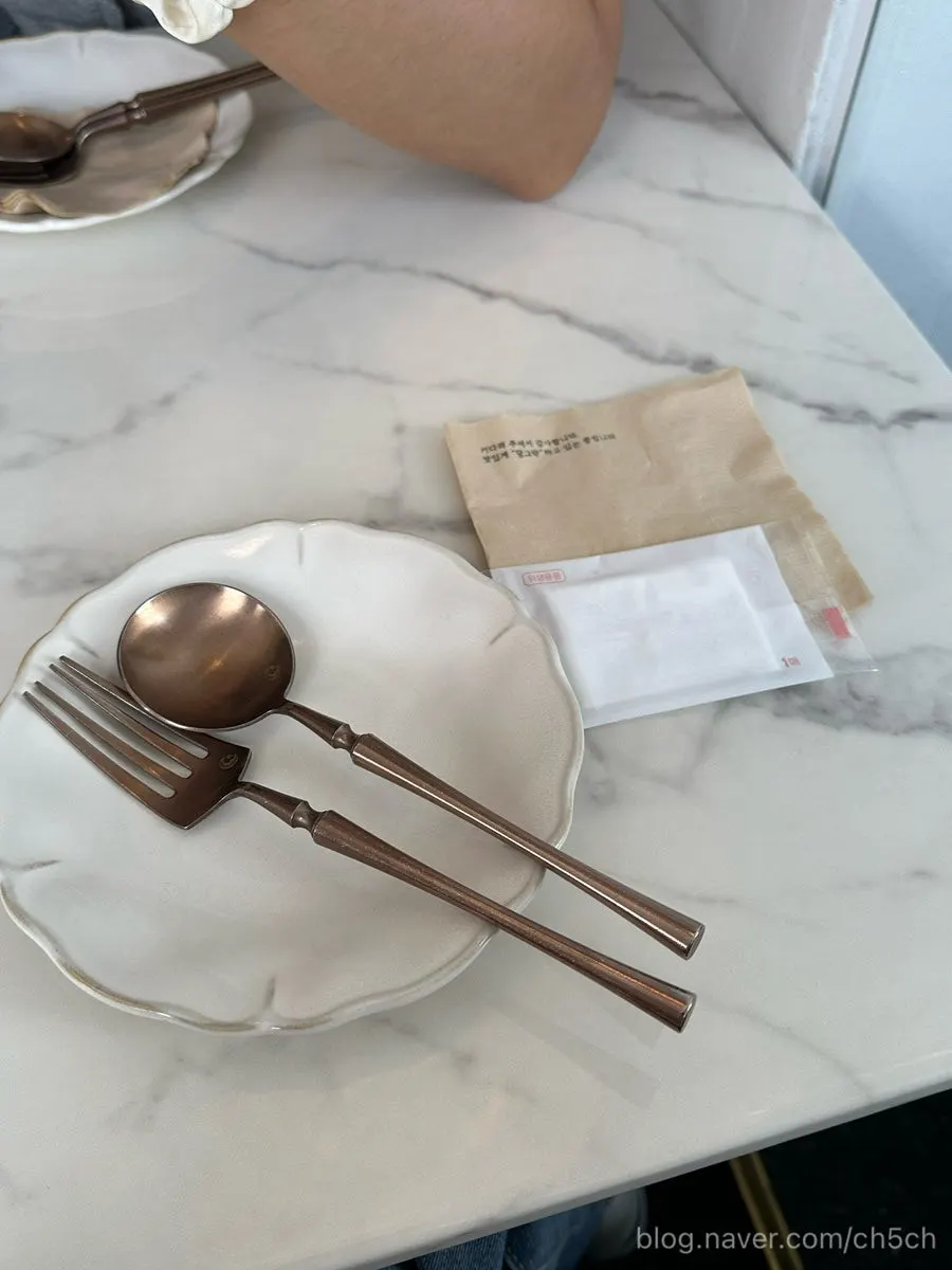 Antique-style table setting and dishware