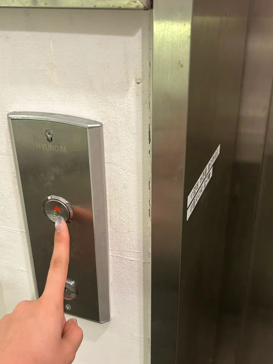 Entrance that opens with a button press