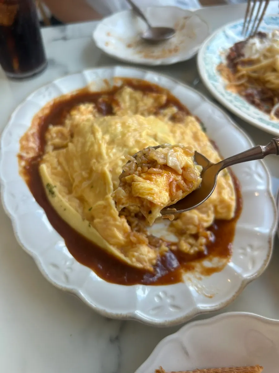 Close-up of the spread-open egg and fried rice