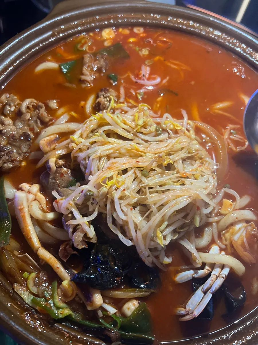 Spicy red broth of the jjamppong soup