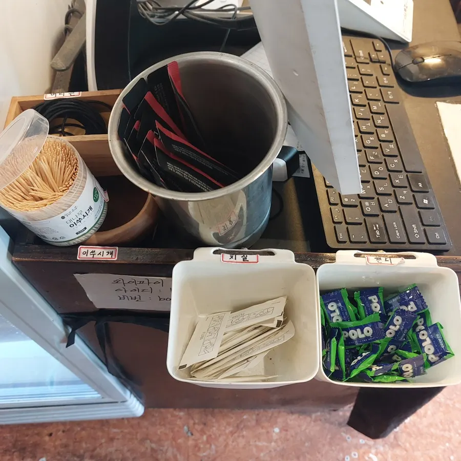Candy and dental floss set out at the counter