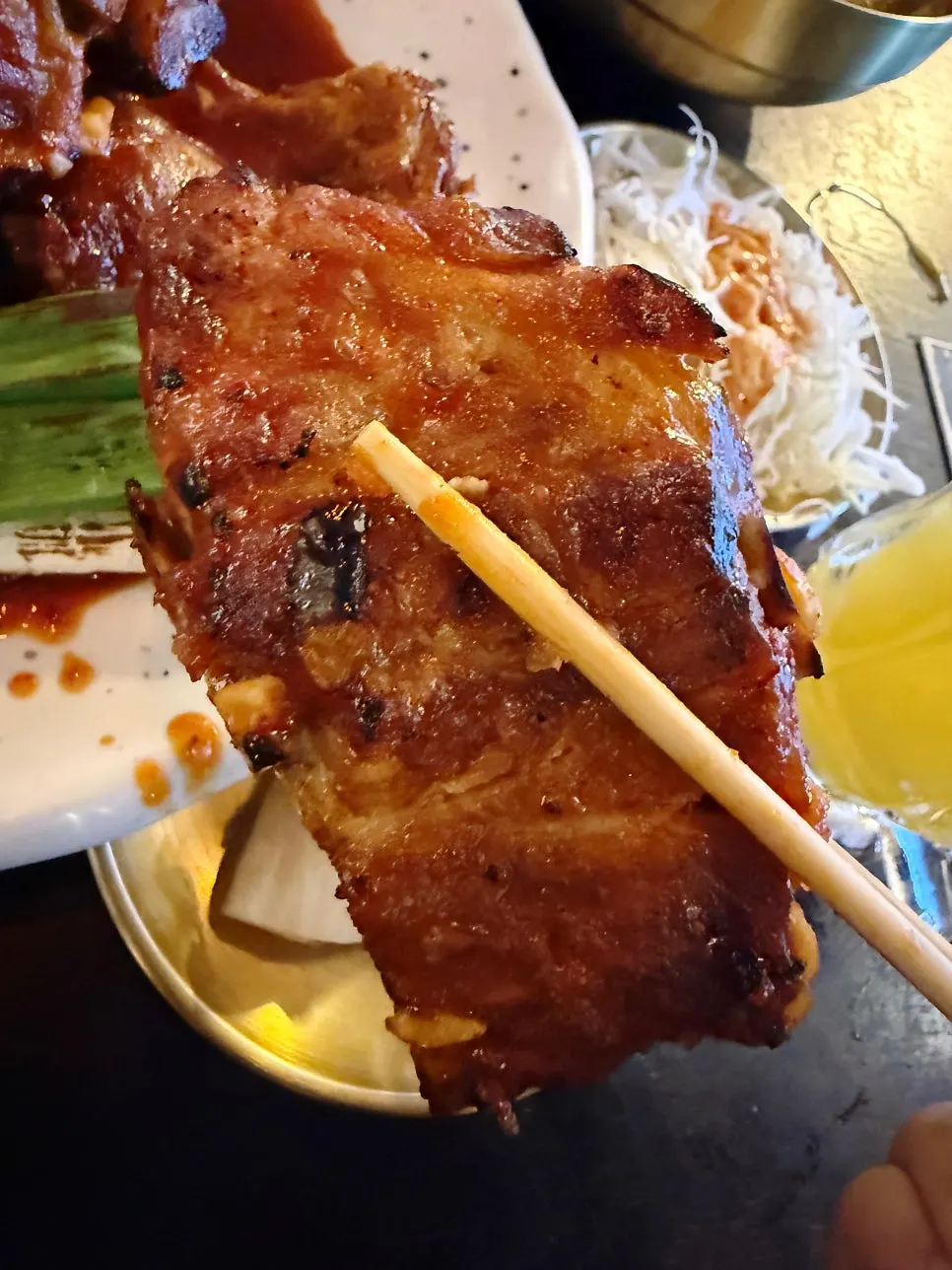 Grilled bones served with grilled green onions